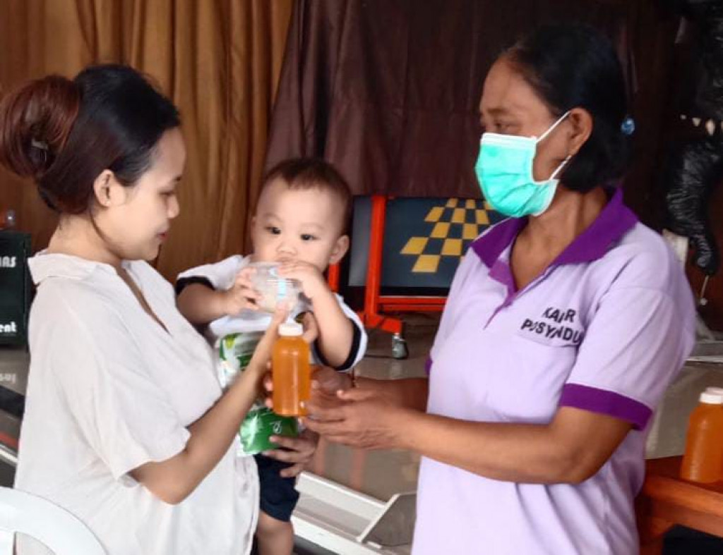 Antusias Warga Banjar Camas Kauh dalam mengikuti Kegiatan Posyandu Balita di Banjar Camas Kauh, Desa Dalung